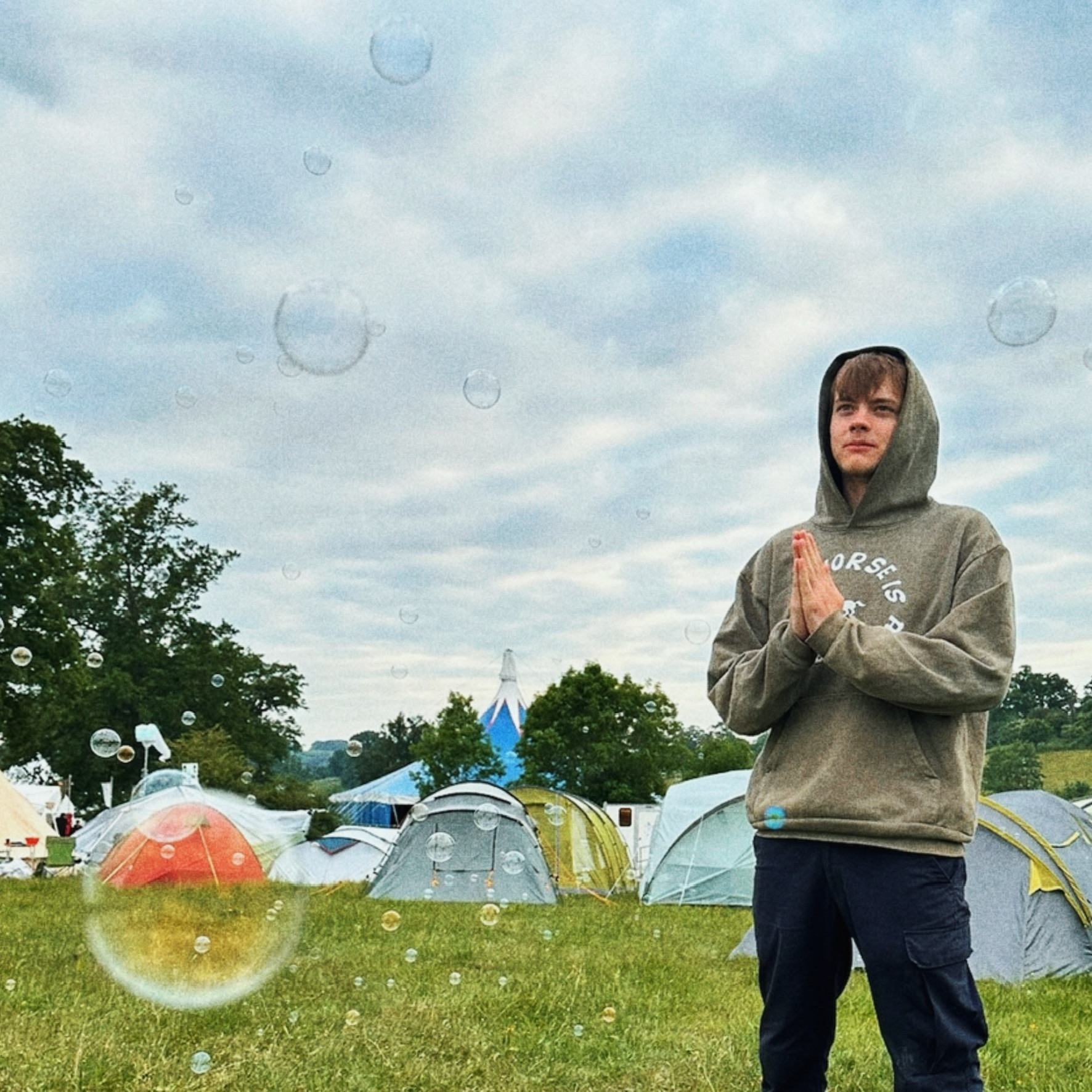 Me standing in front of some tents